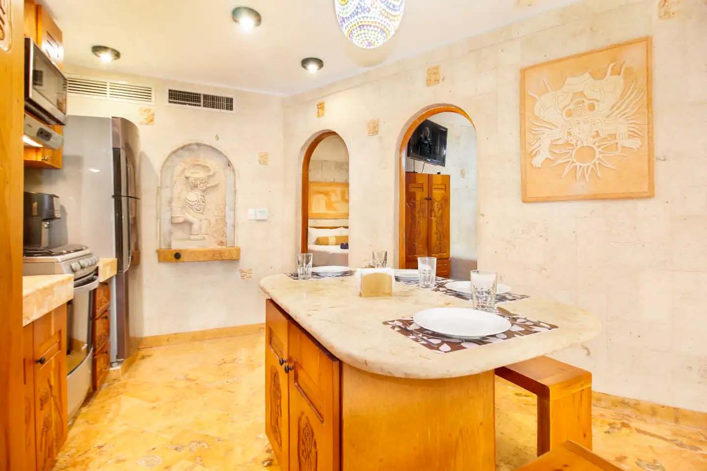 Dining table setup in Condo 103 with elegant tableware