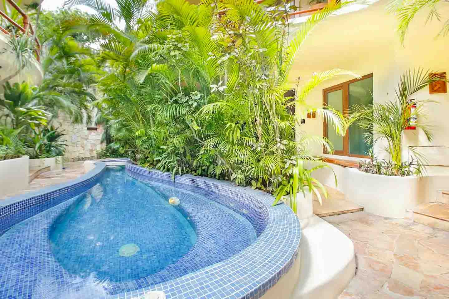 Bathroom vanity in Condo 103 with eco-friendly amenities