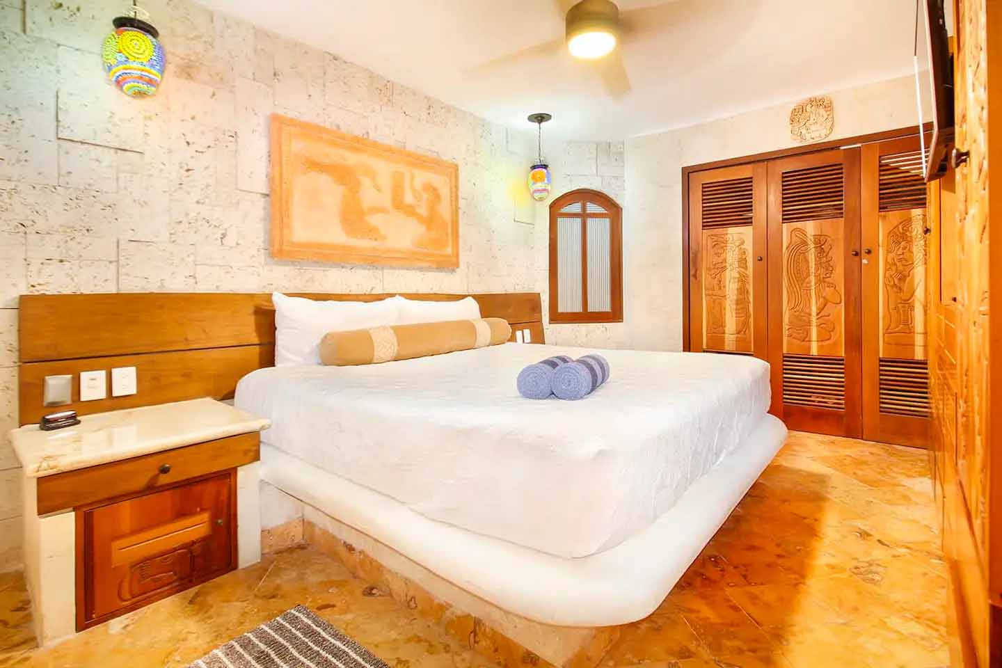 Spacious living room in Condo 103 with modern furnishings and natural light