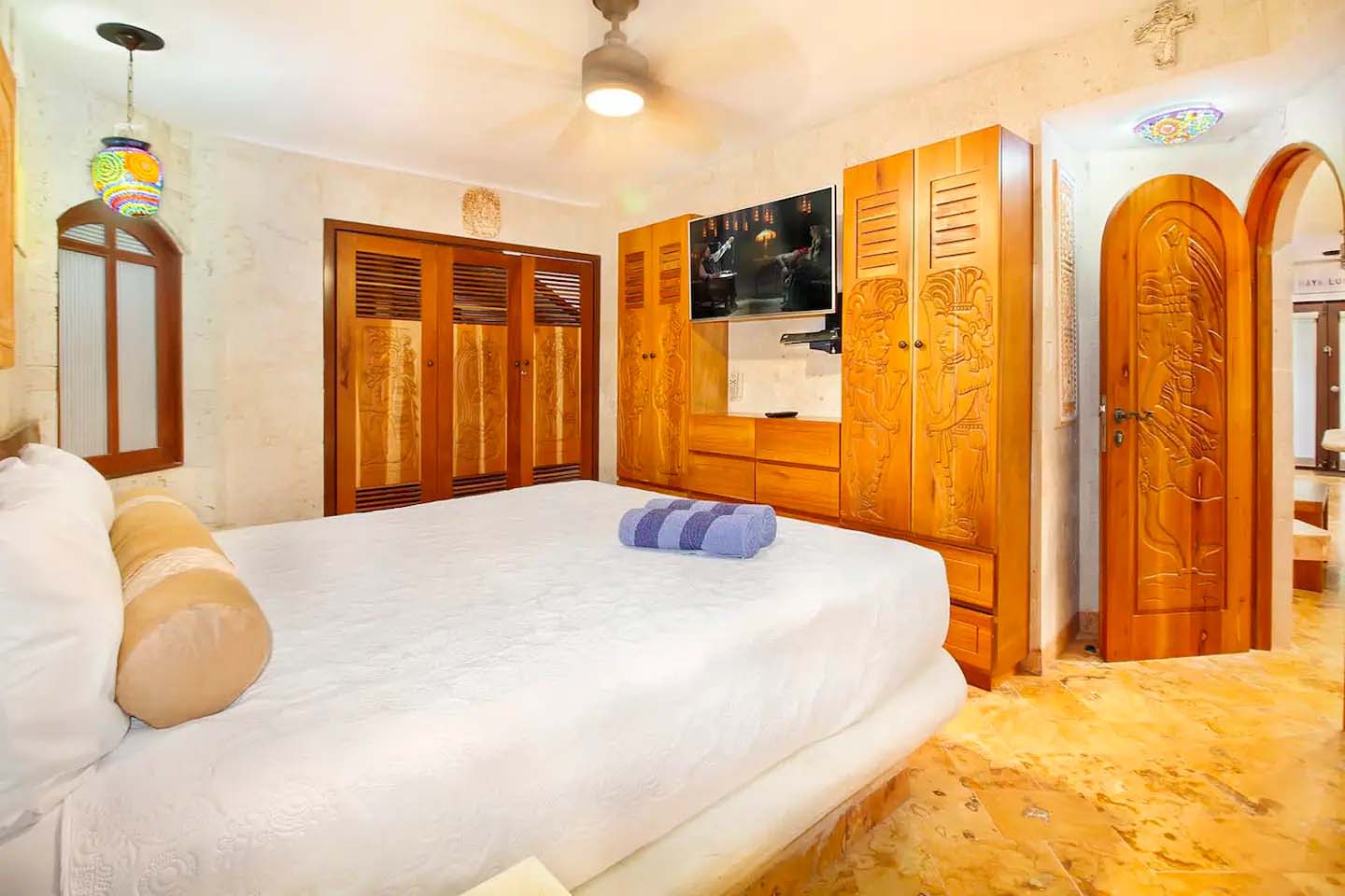 Private balcony at Condo 103 overlooking lush gardens